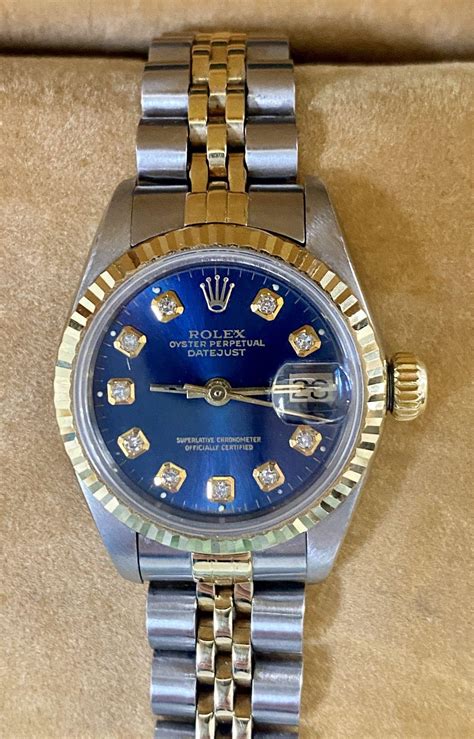 ladies gold rolex with blue face